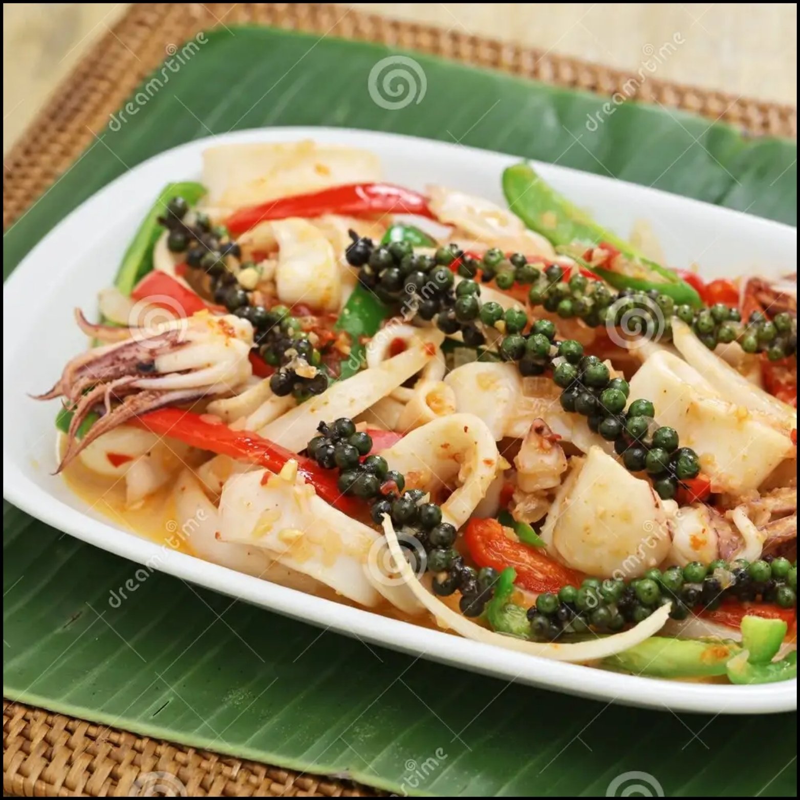 WOK FRIED SQUID WITH BLACK PEPPER SAUCE